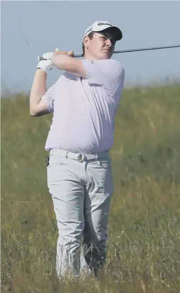  ??  ?? 2 Bob Macintyre, playing a shot on the 18th hole on Sunday, says his ‘dream’ has always been to play in an Open at St Andrews. He ensured that he will be in the line-up for that event by finishing in a tie for eight spot at Royal St George’s