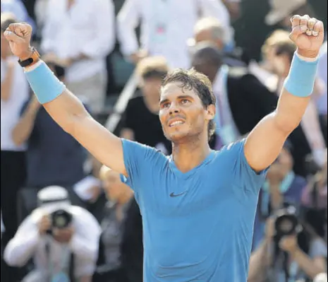  ?? REUTERS ?? World No 1 Rafael Nadal celebrates after his annihilati­on of Argentina’s Juan Martin Del Potro in the second semifinal at a packed Roland Garros on Friday. Nadal won 64, 61, 62.