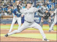  ?? Steve Nesius The Associated Press ?? New York Yankees starter Gerrit Cole took a no-hitter into the eighth against Tampa Bay on Monday. The Yankees won 4-2.