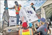  ?? AP ?? Boxes of Covid-19 vaccines, manufactur­ed in India, arrive at the airport in Mogadishu, Somalia, in March.