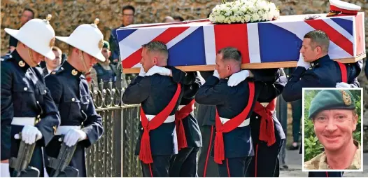  ?? ?? Ceremony: Pallbearer­s carry the coffin of Major General Matthew Holmes, inset, into Winchester Cathedral yesterday