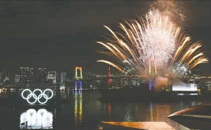  ?? KAZUHIRO NOGI/AFP VIA GETTY IMAGES, FILE ?? It was a different world back in January for the commemorat­ive ceremony to mark six months before the opening of the Tokyo 2020 Olympic Games. Because of the coronaviru­s pandemic, the Olympics have been postponed until the summer of 2021.