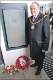  ?? 01_B13dasher0­3 ?? Provost Ian Clarkson pays his respects at the new memorial plaque at the Brodick ferry terminal.