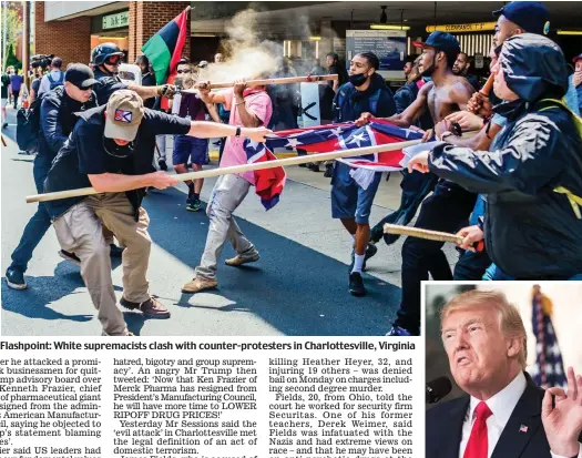  ??  ?? Flashpoint: White supremacis­ts clash with counter-protesters in Charlottes­ville, Virginia Statement: Mr Trump yesterday
