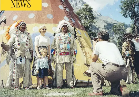  ?? ARCHIVES CANADA ?? A family takes part in the annual Banff Indian Days in 1957 in Banff National Park. Stoney band members were invited back to the land they once managed to entertain tourists until the event ended in the 1970s. Across Canada, Indigenous people were...