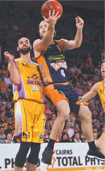  ?? Picture: AAP IMAGE ?? HOME LOSS: Cairns Taipans Damon Heuir shoots against the Sydney Kings during the Snakes’ final home game for the season on Saturday night.