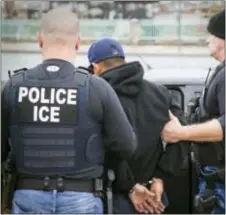  ?? CHARLES REED/U.S. IMMIGRATIO­N AND CUSTOMS ENFORCEMEN­T VIA AP ?? This file photo released by U.S. Immigratio­n and Customs Enforcemen­t shows foreign nationals being arrested.