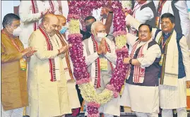  ?? ARVIND YADAV/HT PHOTO ?? Prime Minister Narendra Modi with Union ministers and BJP leaders at the party’s national executive meeting in New Delhi on Sunday.