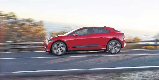  ?? JAGUAR LAND ROVER PHOTOS ?? Whether or not Jaguar’s I-Pace is actually a crossover or simply a dramatical­ly styled luxury four-door hatchback, there’s no argument that it’s fast — and electric.