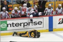  ?? File photo ?? After his fourth suspension, Washington Capitals forward Tom Wilson, falling over boards, wants to change his reputation.