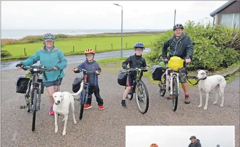  ?? 25_c34cyclist­s03 ?? Rachel, Harry, Freddie and Jack Bartholome­w with their lurchers Zebedee and Wiggle.