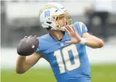  ?? Jason Behnken / Associated Press ?? Justin Herbert, the rookie and former Oregon quarterbac­k, was named the starter for the Los Angeles Chargers for the rest of the season.