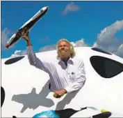  ?? Adrian Dennis AFP/Getty Images ?? RICHARD Branson’s Virgin Galactic says it could start commercial space tourism service in early 2020.