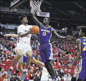  ?? Erik Verduzco Las Vegas Review-Journal @Erik_Verduzco ?? UNLV sophomore forward Tervell Beck goes up for a shot against San Jose State center Oumar Barry during the first half of the Rebels’ 94-56 victory Saturday at the Thomas &amp; Mack Center. Beck scored four points in the win.