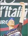  ??  ?? Italy’s rider Matteo Trentin celebrates on the podium after winning the 18th stage of the 99th Giro d’Italia, Tour of Italy, from Muggio to Pinerolo on May
26.