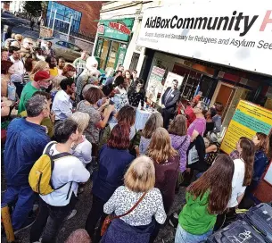  ?? ?? Flashback: Crowds at the opening of Aid Box Community’s hub on Cheltenham Road, which they have now outgrown