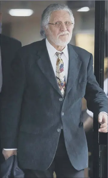  ?? Picture: Getty ?? Former Radio 1 DJ Dave Lee Travis leaves Southwark Crown Court yesterday