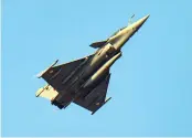  ?? — PTI ?? IAF’s Rafale fighter jet flies over Rajpath, during the 72nd Republic Day celebratio­ns in New Delhi on Tuesday.