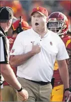  ??  ?? CLAY HELTON potentiall­y has only one game left as football coach at USC.