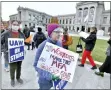  ?? AP PHOTO/JOSH REYNOLDS, FILE ?? FILE - Museum curator Victoria Bunting, center, pickets in front of the Museum of Fine Arts on Nov. 17, 2021, in Boston.