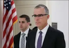  ?? Chip Somodevill­a/ Getty Images ?? Federal Bureau of Investigat­ion Deputy Director Andrew McCabe, foreground, is on his way to a meeting in the Rayburn House Office Building in 2017 in Washington.