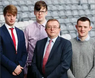  ??  ?? Paul Ellis, Toby Joyce and Liam Gaffney at their induction in Croke Park with Pat Naughton from the ESB.