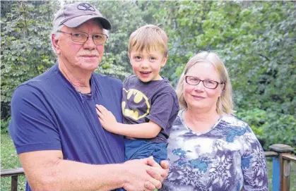  ?? JIM DAY/THE GUARDIAN ?? Dale and Lori Mahar are caring for their grandson Jensen as the boy’s father, Ryan Mahar, fights for life in a hospital in Moncton. Ryan has been in a coma since a serious fall while building a warehouse in the Elmsdale area on Sept. 4.