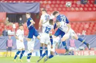  ?? - AFP photo ?? FC Porto’s Iranian forward Mehdi Taremi (2R) heads the ball during the quarter final second leg football match between Chelsea and Porto at the Ramon Sanchez Pizjuan stadium in Seville.