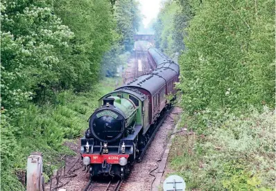  ?? ?? Having departed West Brompton hauling Steam Dreams’ circular ‘Hampshire Hills’ tour, LNER B1 No. 61306 Mayflower passes Botley on its way towards Eastleigh on May 17. The return journey of the circular tour would terminate at London Victoria later that day. DON BENN