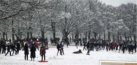  ?? Picture: LIAM FORD@LJFPICS ?? Youngsters gather for a mass snowball fight in Leeds; right, children in Wakefield