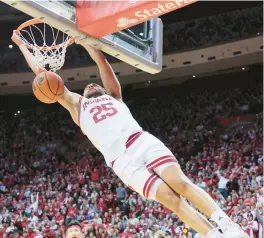  ?? ANDY LYONS/GETTY ?? Race Thompson of Indiana dunks against Nebraska on Wednesday.