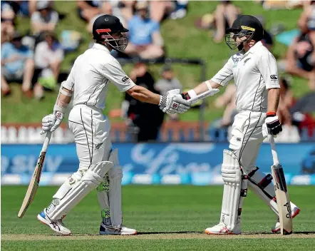  ?? AP ?? Kane Williamson, left, and Tom Latham put on 162 for the second wicket to put New Zealand in control of the first test.