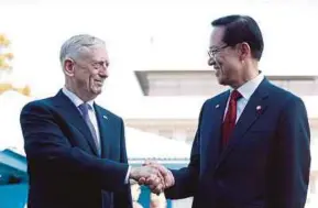  ?? EPA PIC ?? United States Defence Secretary Jim Mattis (left) and South Korean Defence Minister Song Young-moo at the Demilitari­sed Zone in Paju, South Korea, yesterday.