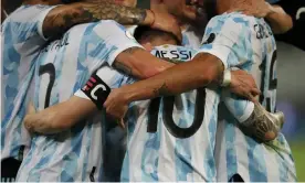  ?? Copa América. Photograph: Ricardo Moraes/Reuters ?? Lionel Messi celebrates with his Argentina teammates after scoring against Chile in the