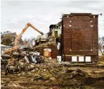  ?? NICK GRAHAM / STAFF ?? The Butler County Land Bank used Delinquent Tax Assessment Collection dollars to help raze the former Taylor School in November 2019 on Corwin Avenue in Hamilton.