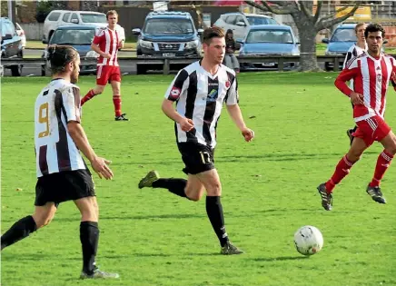  ??  ?? Logan Raynel, centre, scored Waikato Stud Matamata Swifts opening goal.