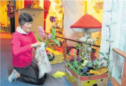  ?? Photos / Sue Emeny ?? Joan Jameson is a new volunteer who is helping pack up the Fantasy Cave displays.