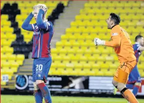  ??  ?? Hard-earned point Neil Alexander was the star of the show for Livi