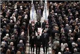  ?? BRENDAN SMIALOWSKI / POOL PHOTO VIA AP ?? The escorted casket of former Secretary of State Madeleine Albright is taken out of the Washington National Cathedral, after a funeral service on Wednesday in Washington.