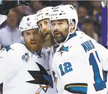  ?? Jamie Squire / Getty Images ?? Joe Thornton (center, with Joe Pavelski at left) and Patrick Marleau (right) are still key Sharks at age 37.