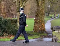  ??  ?? A police officer on patrol in Bristol