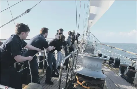  ??  ?? GREAT ENVIRONMEN­T Junior sailors are put to sea on the Tenacious to continue their naval training