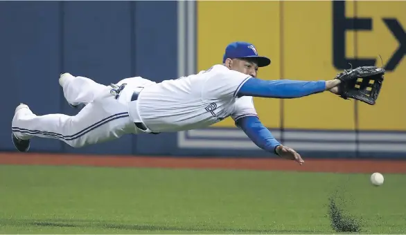  ?? TOM SZCZERBOWS­KI/ GETTY IMAGES ?? Ezequiel Carrera was a late insert into Friday’s Jays lineup as outfielder Kevin Pillar was scratched with flu-like symptoms. The Jays beat the Twins 15-8.