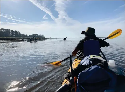  ??  ?? Photo for The Washington Post by David Brown
Kayakers paddle on a branch of the Altamaha River, on the north side of Little St. Simons Island, Ga., on Nov. 1, 2019. Numerous rivers and creeks flow around and through Georgia’s Sea Islands.