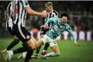  ?? Paul Ellis/AFP/Getty Images ?? Newcastle’s Bruno Guimaraes fouls Samuel Edozie in the incident that led to the Brazilian midfielder being sent off. Photograph: