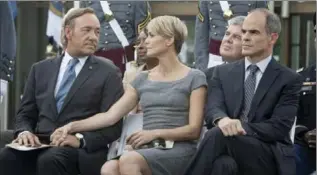  ?? PATRICK HARBRON, NETFLIX ?? Kevin Spacey, Robin Wright and Michael Kelly in a scene from Netflix’s “House of Cards.”