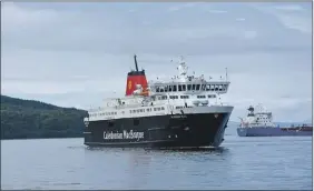  ?? 01_B26caley01 ?? The MV Caledonian Isles sails into a sunny Brodick on Wednesday.