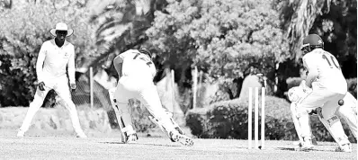  ?? CWI PHOTO ?? West Indies Championsh­ip action between the West Indies Academy and the Leeward Islands Hurricanes at Warner Park in St Kitts yesterday.