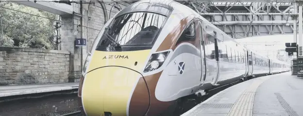  ??  ?? 0 A Saltire and tartan branded Azuma train is due to go into service from Edinburgh today, with faster wi-fi and USB chargers in first class, far left, and more space and power sockets in standard class, left