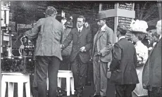  ??  ?? From left, Yeadon scholars in 1910 at proclamati­on of King George V; Leeds illuminate­d tramcar to celebrate the coronation of George V, June 22, 1911; King George V visiting Rylands Glassworks Barnsley in 1912.